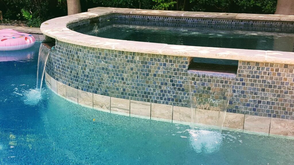 new pebble finish water line tile lueders coping dallas