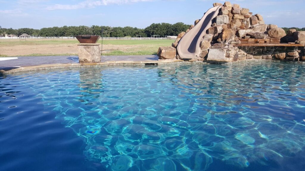tall water slide feature pool dallas fort worth