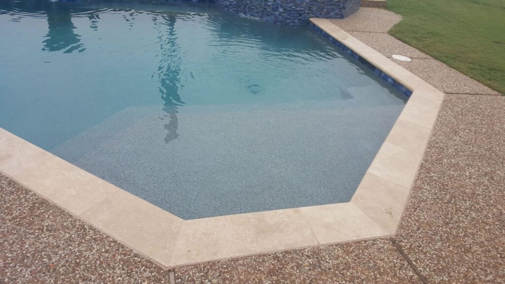tanning ledge aggregate deck colleyville