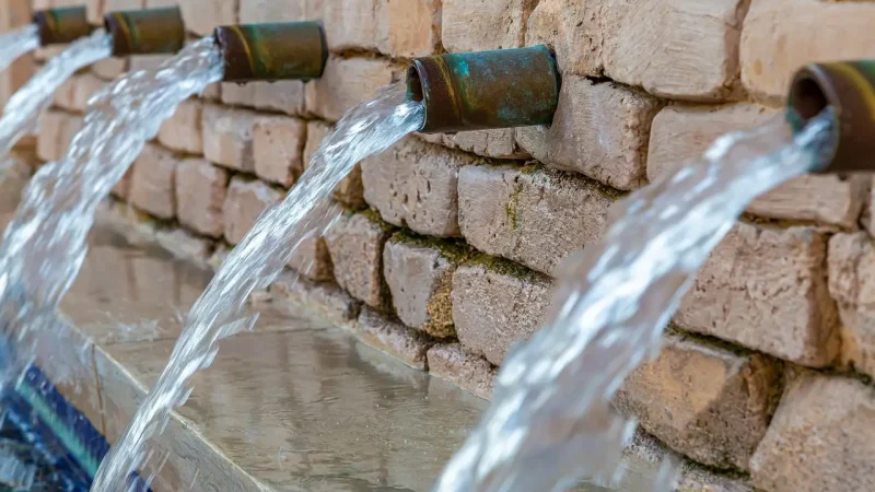 professional technician testing for pool leak