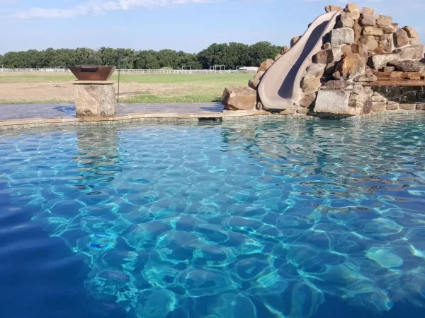 tall-water-slide-feature-pool-dallas-fort-worth